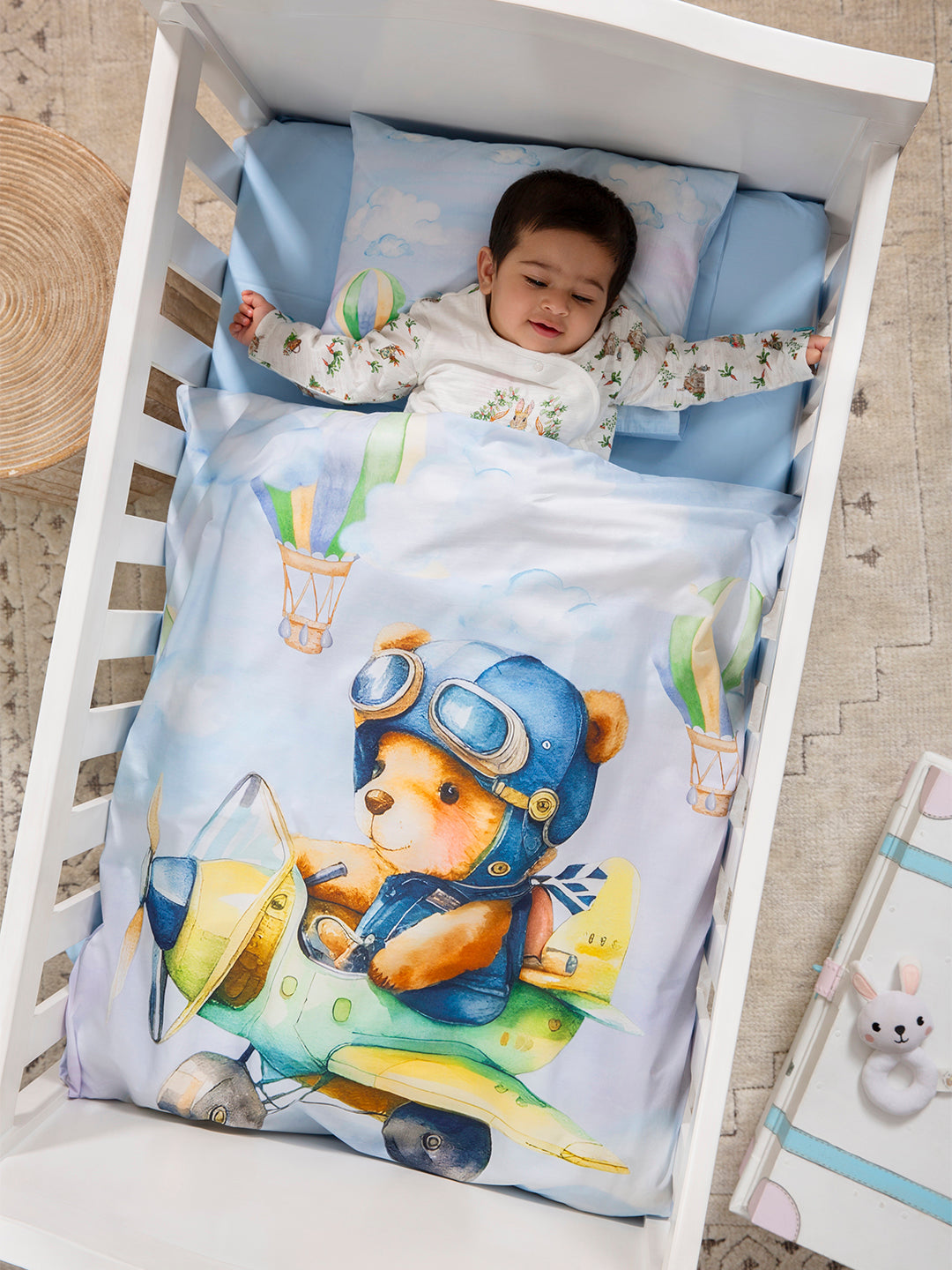The 'Teddy's Dream Fly ' baby bedding set featuring our weightless and light AC comforter for newborns, made from 100% Egyptian cotton.