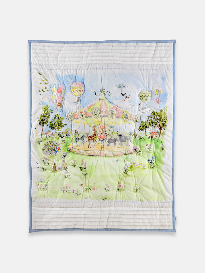 A mystical piece of furnishing featuring 'Carnival Carousel' in an enchanted forest to let your little bub enjoy a warm and soft night of deep sleep