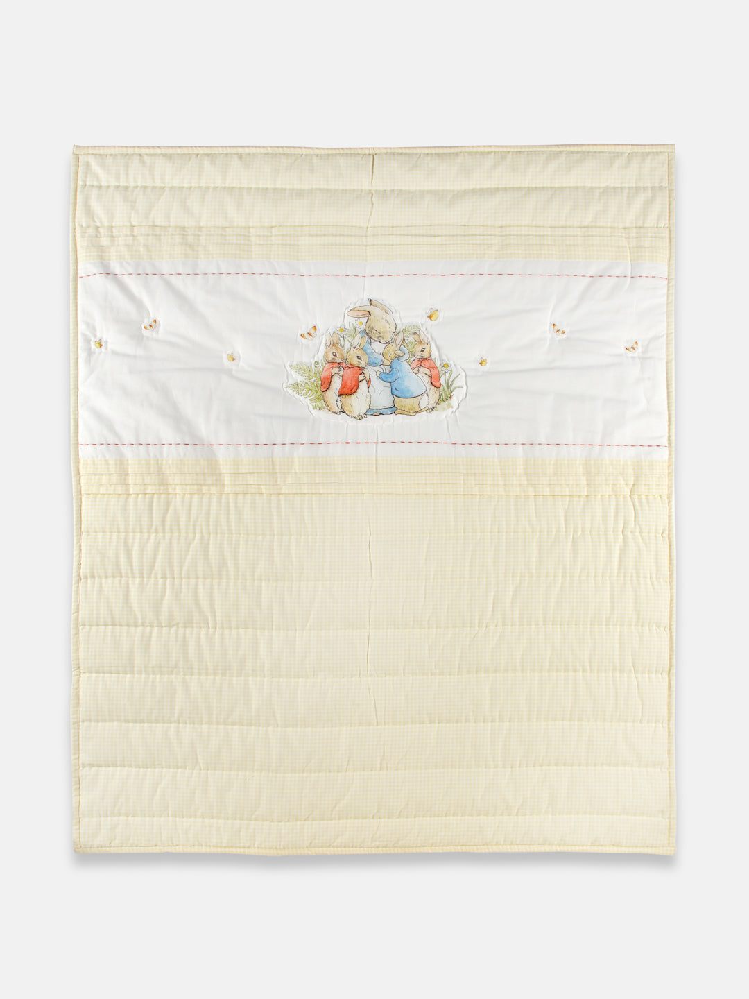 This  yellow Peter Rabbit quilt set with a pillow that features an adorable Peter Rabbit print and is made from soft cotton fabric. The Peter Rabbit print is a classic and timeless design that has been beloved for generations, making it a great choice for a baby gift. 