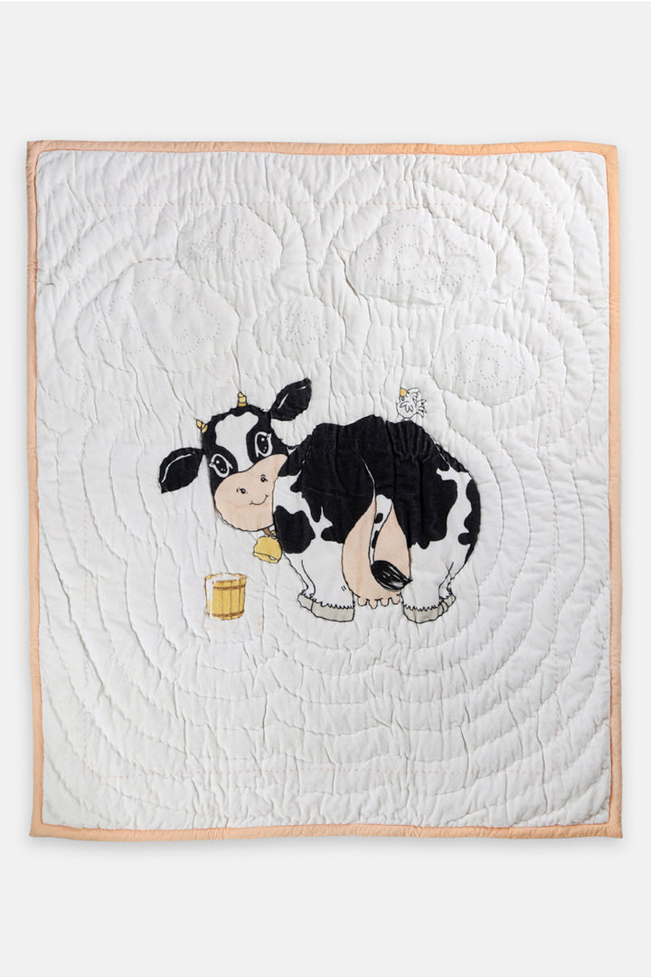 Moo Quilt features a big cow print design with a matching cow print pillow is perfect for adding a cozy and rustic touch to any bedroom or living space